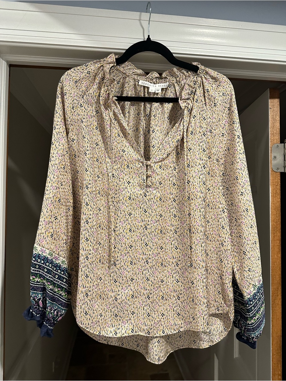 Veronica Beard Cream Speckled Tie-Neck Blouse with Navy Accent Cuffs